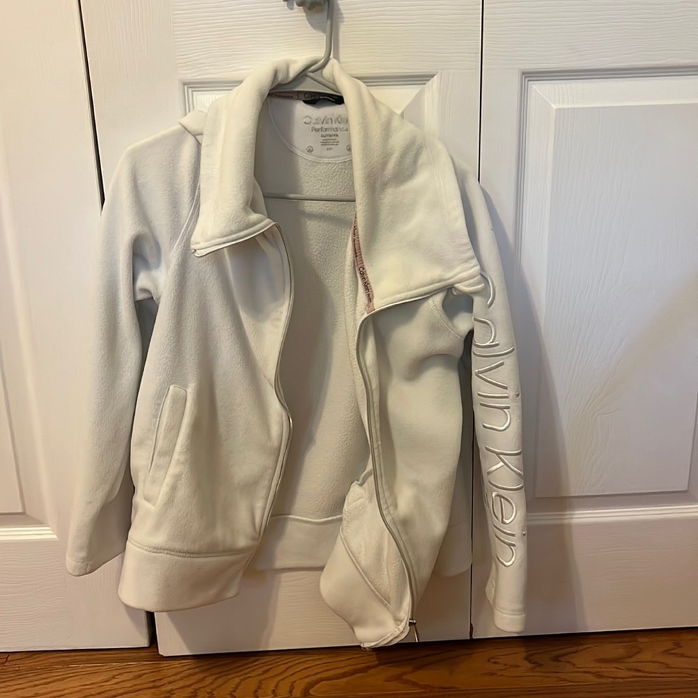 This is an  XL, white, Calvin Klein heavy sweater.